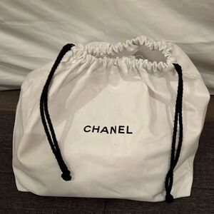 Brand new authentic Chanel bag/pouch with drawstring!